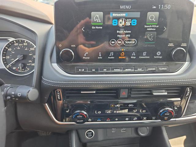 Photo of 2023 Super Black Nissan Rogue