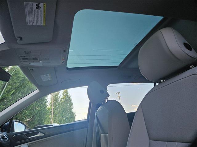 Photo of 2022 Atlantic Blue Metallic Volkswagen Tiguan