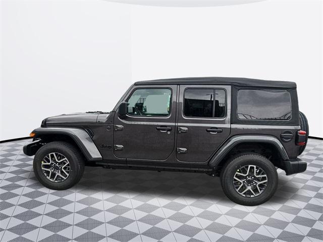 Photo of 2025 Crystal Metallic Jeep Wrangler