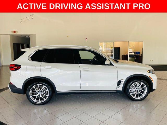 Photo of 2024 Mineral White Metallic BMW X5