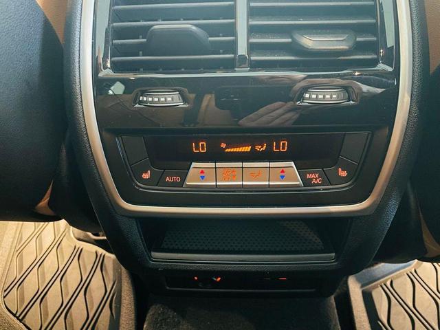 Photo of 2024 Mineral White Metallic BMW X5