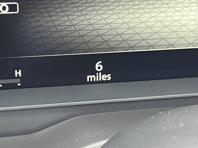 Photo of 2026 Scarlet Ember Tintcoat Nissan Rogue