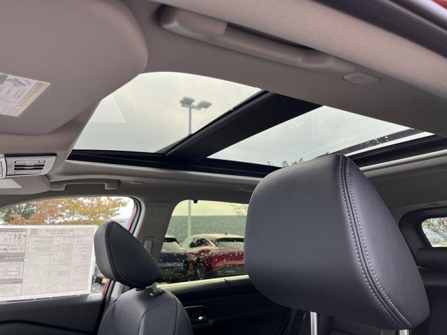 Photo of 2026 Scarlet Ember Tintcoat Nissan Rogue