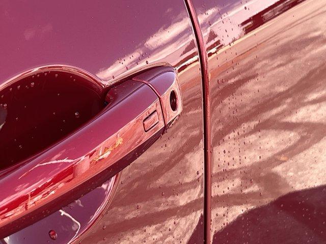 Photo of 2026 Scarlet Ember Tintcoat Nissan Rogue
