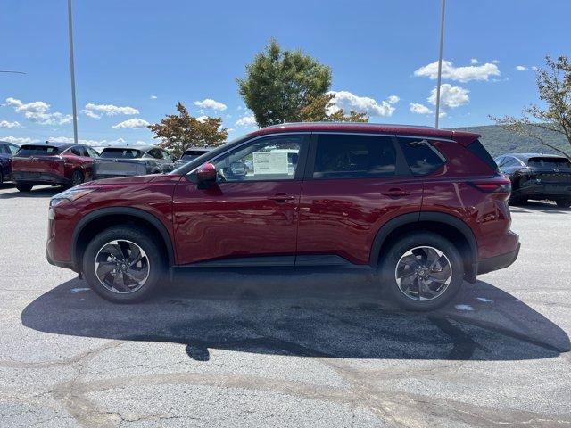 Photo of 2026 Scarlet Ember Tintcoat Nissan Rogue