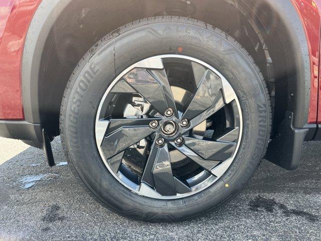 Photo of 2026 Scarlet Ember Tintcoat Nissan Rogue