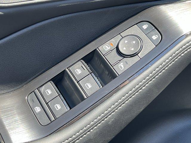 Photo of 2026 Scarlet Ember Tintcoat Nissan Rogue