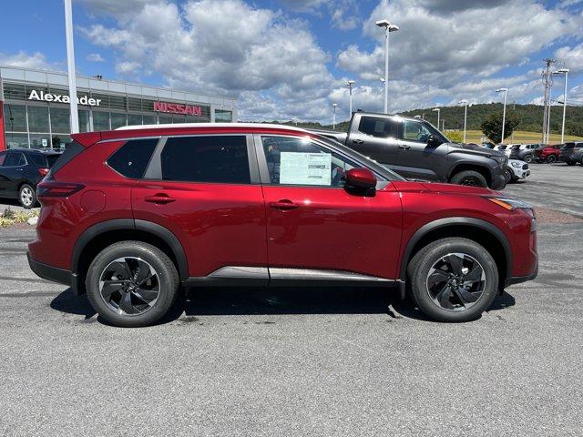 Photo of 2026 Scarlet Ember Tintcoat Nissan Rogue