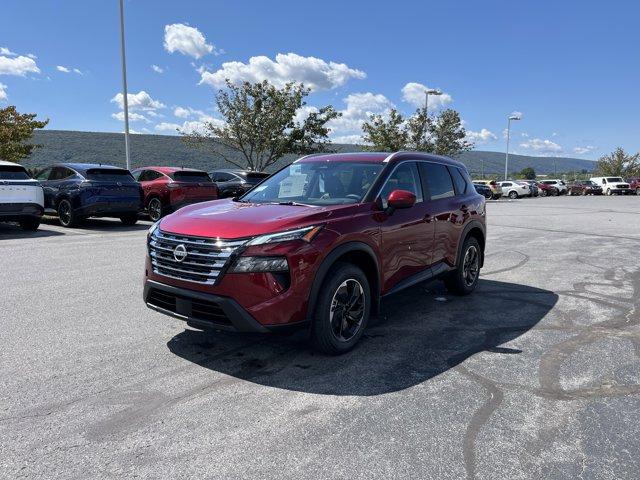 Photo of 2026 Scarlet Ember Tintcoat Nissan Rogue