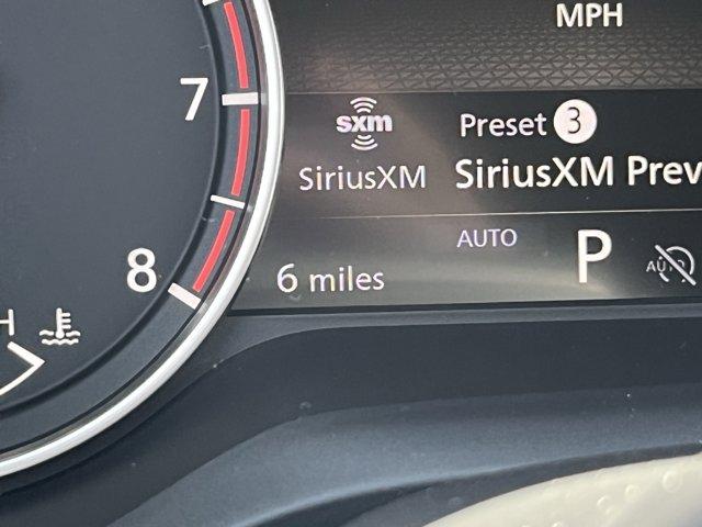 Photo of 2026 Scarlet Ember Tintcoat Nissan Rogue