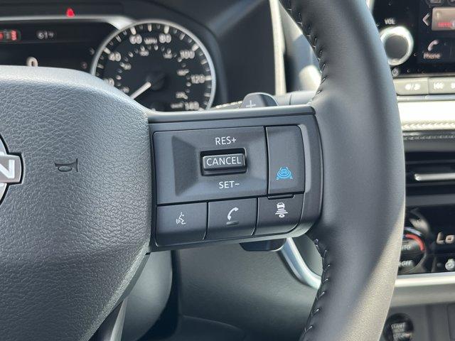 Photo of 2026 Scarlet Ember Tintcoat Nissan Rogue