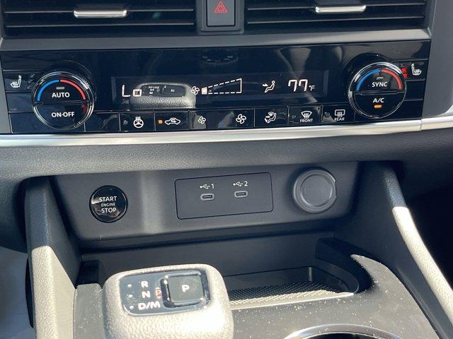 Photo of 2026 Scarlet Ember Tintcoat Nissan Rogue