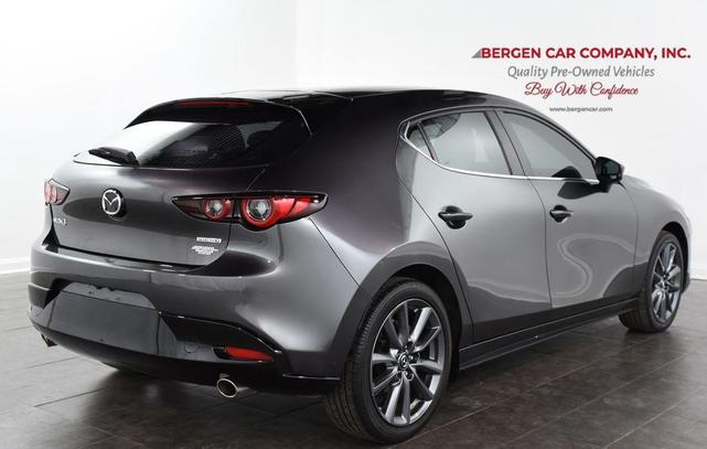 Photo of 2023 Machine Gray Metallic Mazda Mazda3