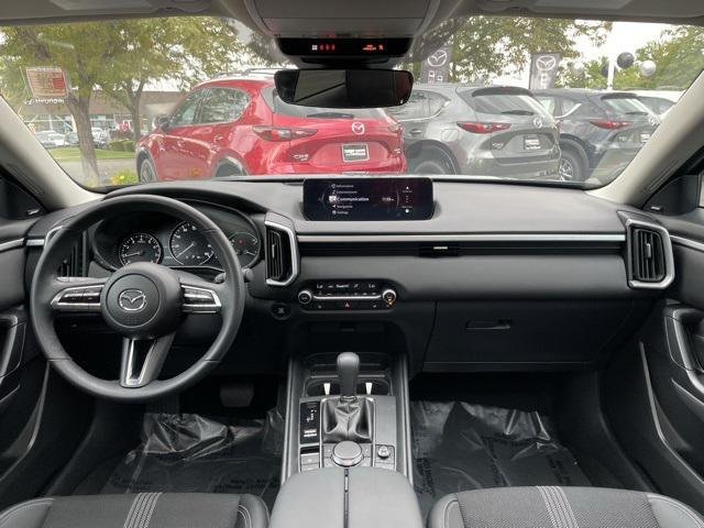 Photo of 2025 Ingot Blue Metallic Mazda CX-50