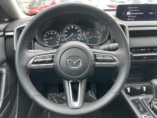 Photo of 2025 Ingot Blue Metallic Mazda CX-50