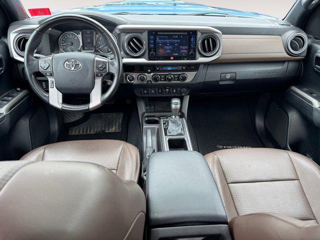Photo of 2016 Blazing Blue Pearl Toyota Tacoma