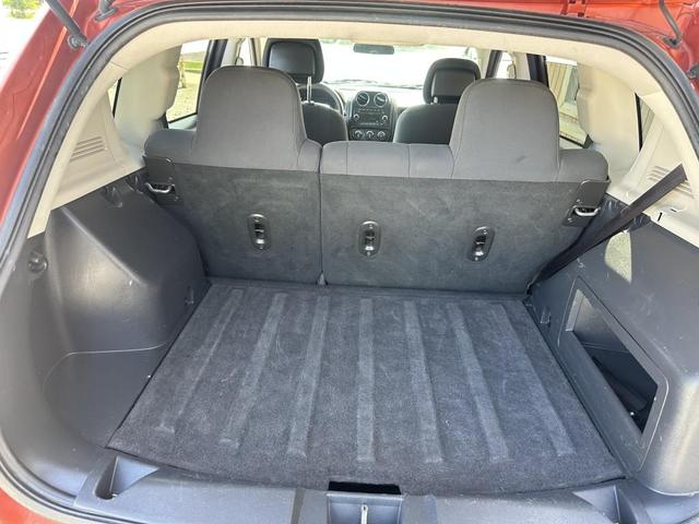 Photo of 2010 Sunburst Orange Pearlcoat Jeep Compass