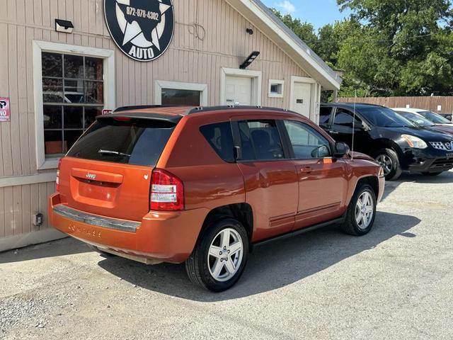 Photo of 2010 Sunburst Orange Pearlcoat Jeep Compass