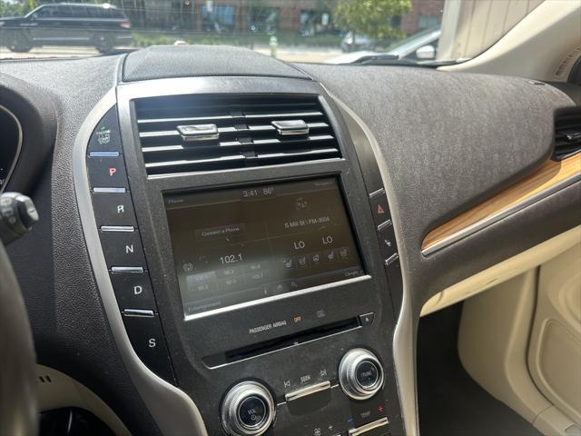 Photo of 2015 Karat Gold Metallic Lincoln MKC