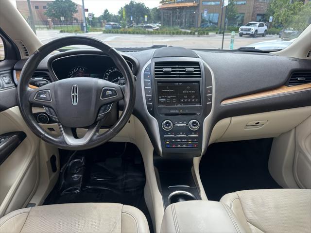 Photo of 2015 Karat Gold Metallic Lincoln MKC