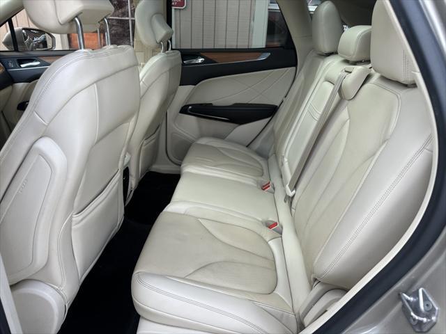 Photo of 2015 Karat Gold Metallic Lincoln MKC