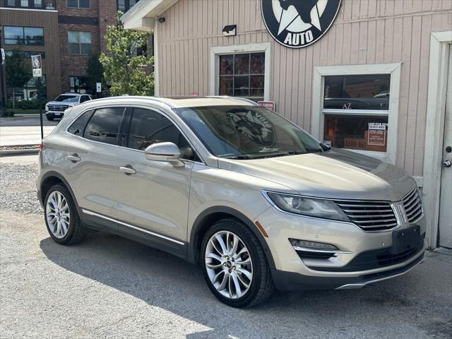 Photo of 2015 Karat Gold Metallic Lincoln MKC