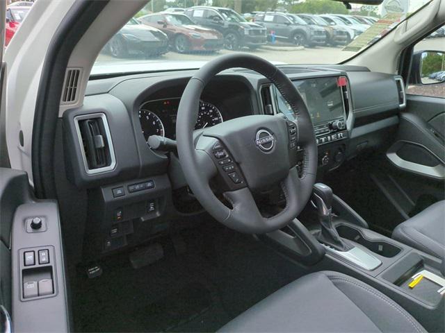 Photo of 2025 Glacier White Nissan Frontier