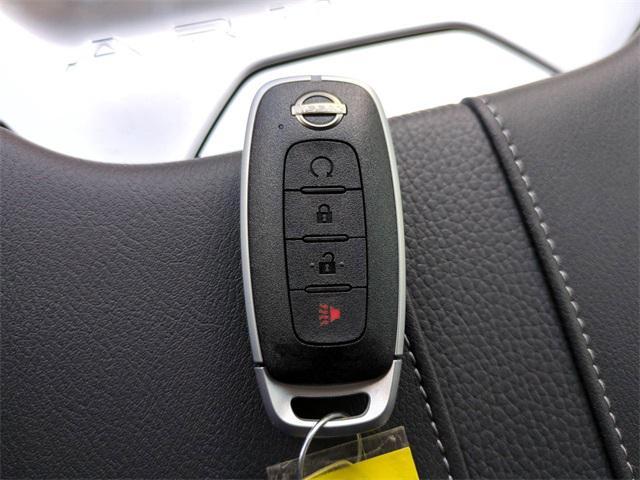 Photo of 2025 Aspen White Tricoat Nissan Armada