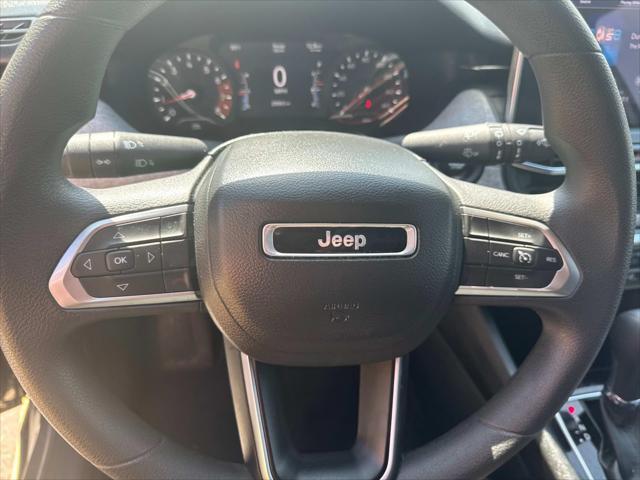 Photo of 2023 Granite Crystal Metallic Clearcoat Jeep Compass