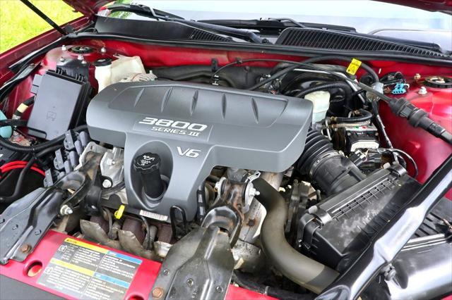Photo of 2005 Cardinal Red Metallic Buick LaCrosse