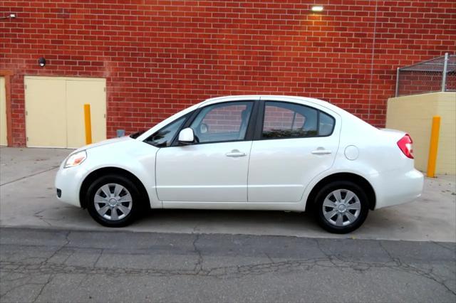 Photo of 2009 White Water Suzuki SX4