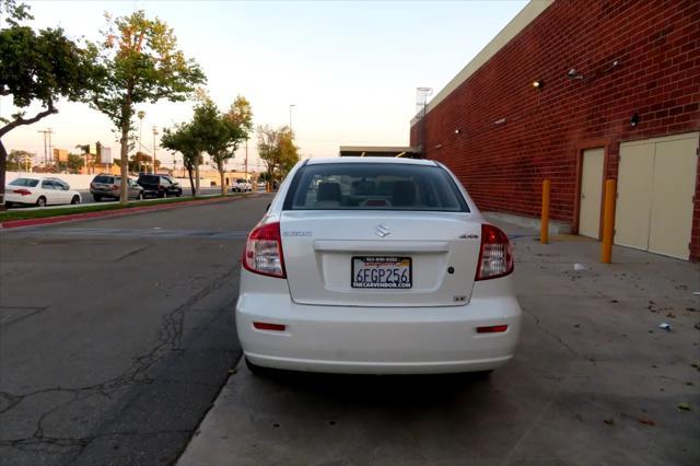 Photo of 2009 White Water Suzuki SX4