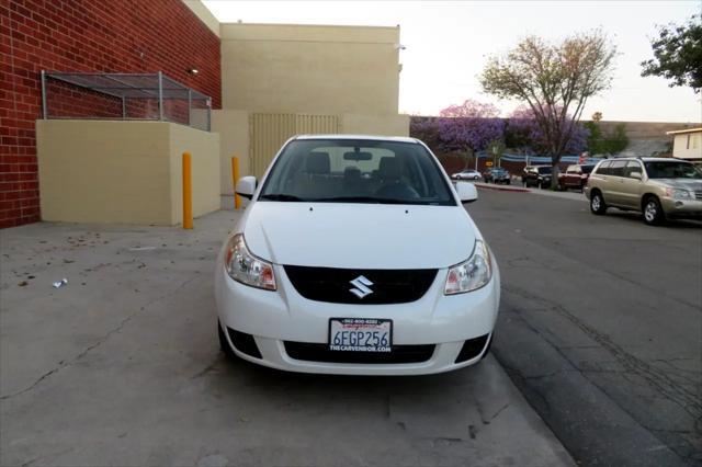 Photo of 2009 White Water Suzuki SX4