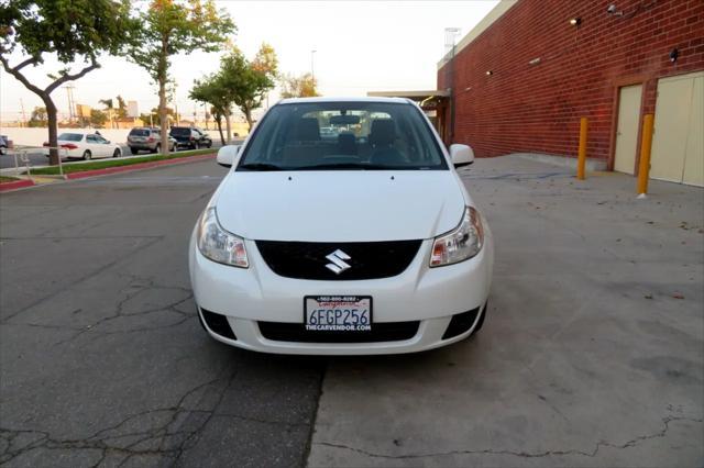 Photo of 2009 White Water Suzuki SX4