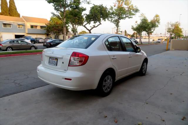 Photo of 2009 White Water Suzuki SX4