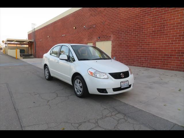 Photo of 2009 White Water Suzuki SX4