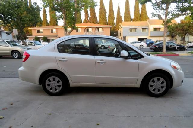 Photo of 2009 White Water Suzuki SX4
