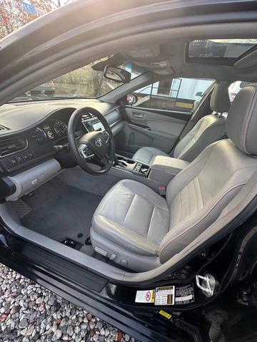 Photo of 2017 Black Toyota Camry Hybrid