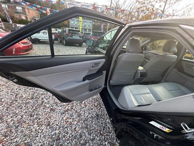 Photo of 2017 Black Toyota Camry Hybrid