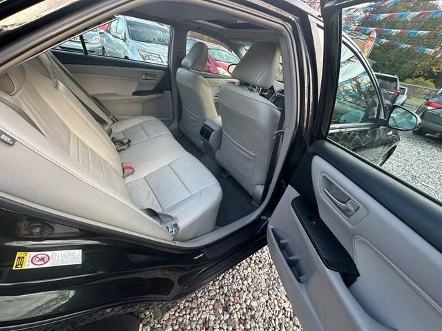 Photo of 2017 Black Toyota Camry Hybrid