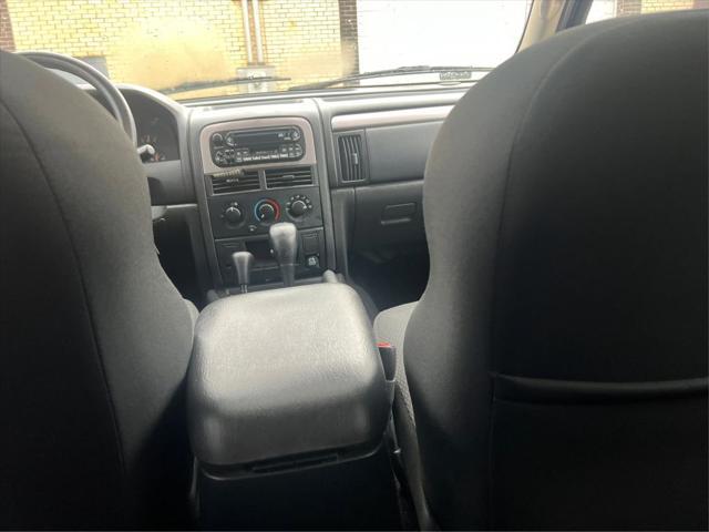Photo of 2004 Red Jeep Grand Cherokee