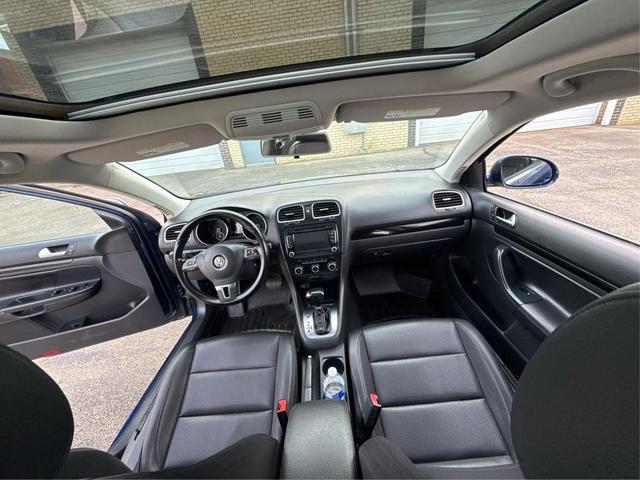 Photo of 2011 Tempest Blue Metallic Volkswagen Jetta SportWagen