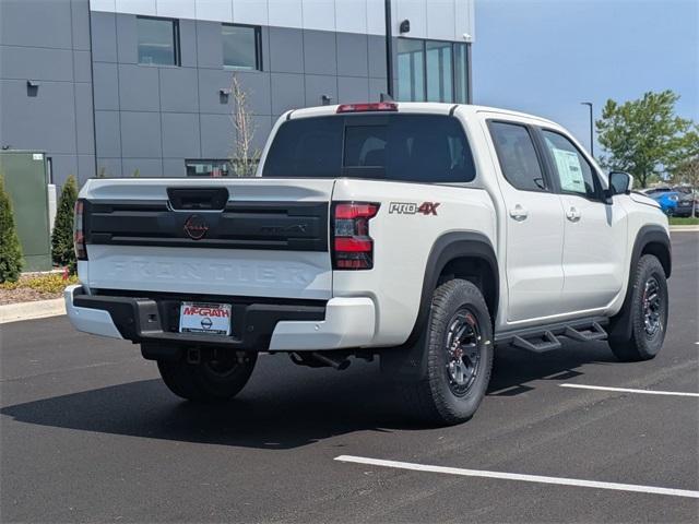 Photo of 2025 Glacier White Nissan Frontier
