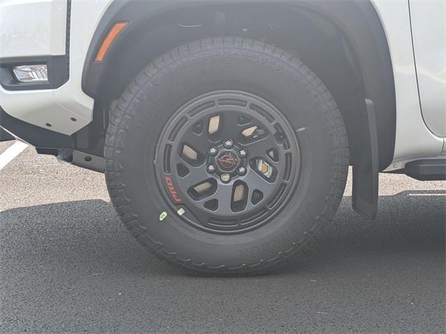Photo of 2025 Glacier White Nissan Frontier