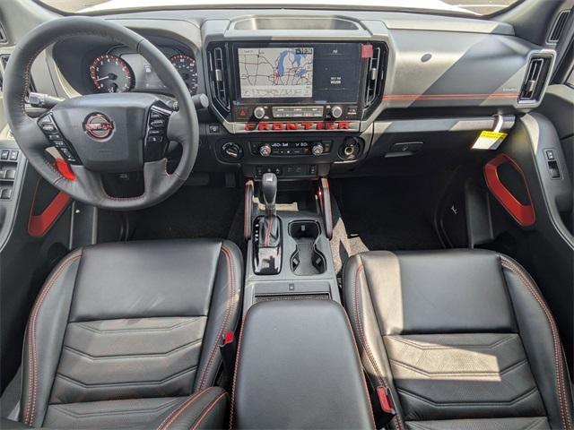 Photo of 2025 Glacier White Nissan Frontier
