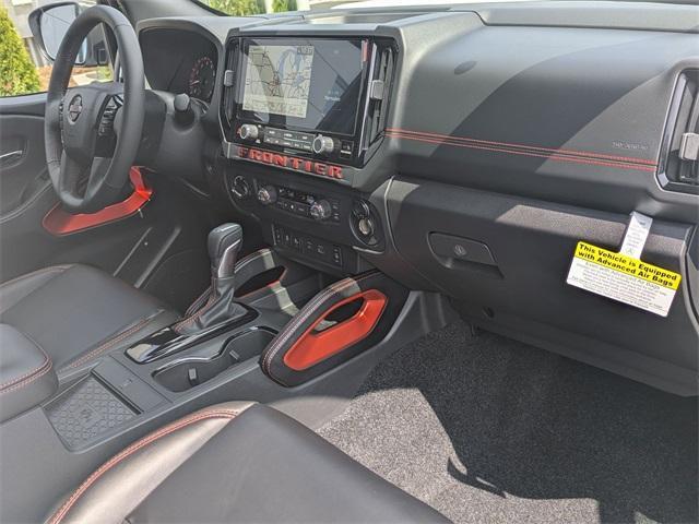 Photo of 2025 Glacier White Nissan Frontier