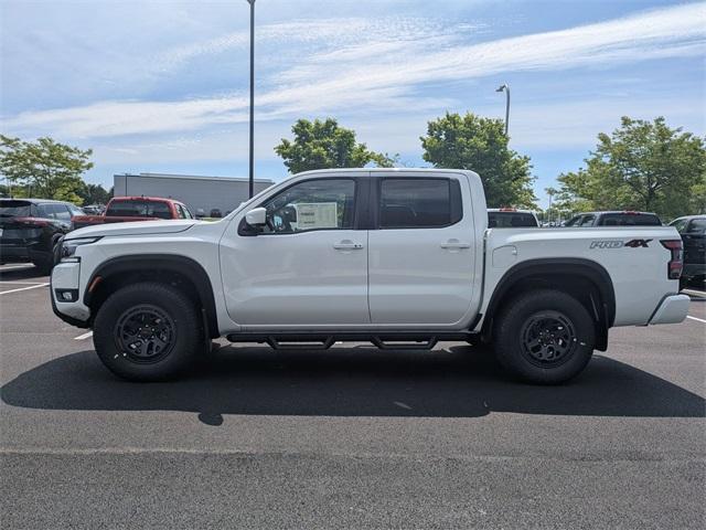 Photo of 2025 Glacier White Nissan Frontier