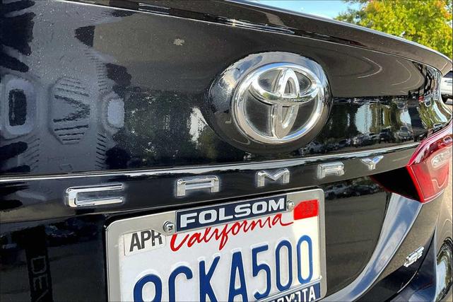 Photo of 2022 Midnight Black Metallic Toyota Camry