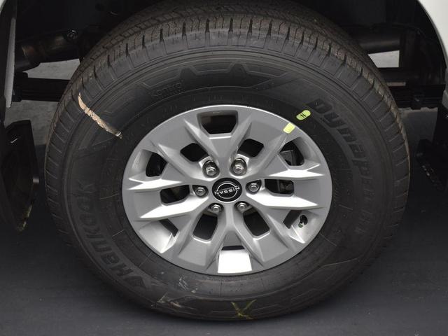 Photo of 2025 Glacier White Nissan Frontier