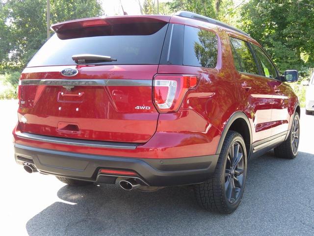 Photo of 2018 Ruby Red Metallic Tinted Clearcoat Ford Explorer